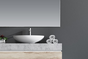 White sink in a gray bathroom
