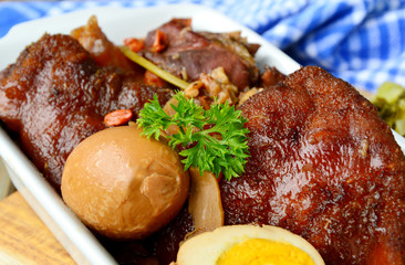 Braised pork leg or Thai style Stewed pork leg (Thai name is Kha Moo Pa Lo).
Pork leg street food menu in Thailand