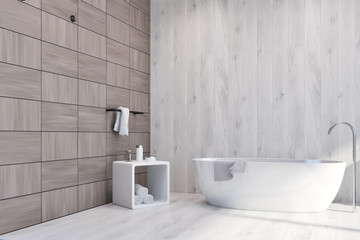 Fototapeta na wymiar White and wooden tiles brown bathroom