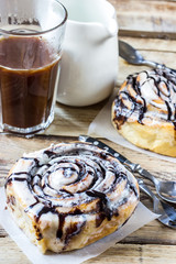 Cinnamon rolls or cinnabons with cream sauce