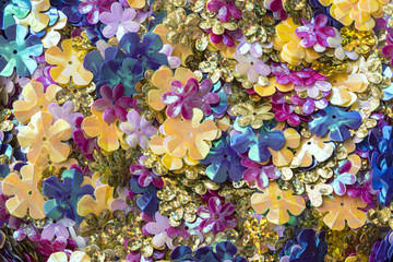 bright shiny sequins in the shape of a flower
