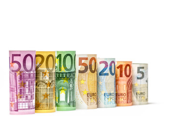 Obraz na płótnie Canvas Several hundred euro banknotes stacked by value.Rolls Euro bankn