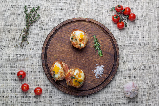 meat caces with eggs on the wooden tray