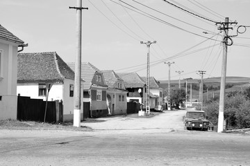 Typical rural landscape and peasant houses in  the village Mercheasa, Transylvania, Romania. The settlement was founded by the Saxon colonists 