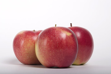 Set of red apples with green leaves. Apple
