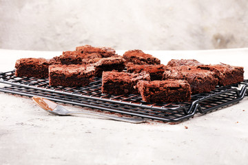 homemade chocolate brownies on rustic table. brownie bakery.