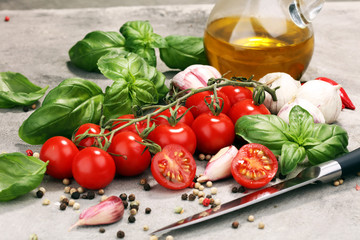 tomato and italian ingredient. Ripe tomatoes with fresh basil, garlic