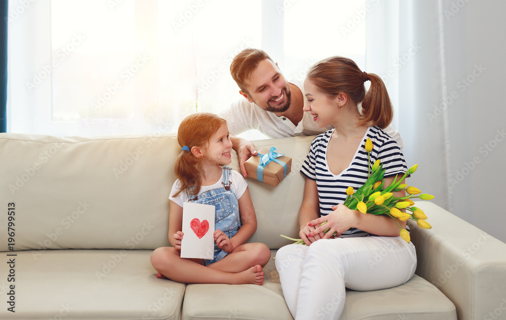 Wall mural happy mother's day! father and child congratulate mother on holiday