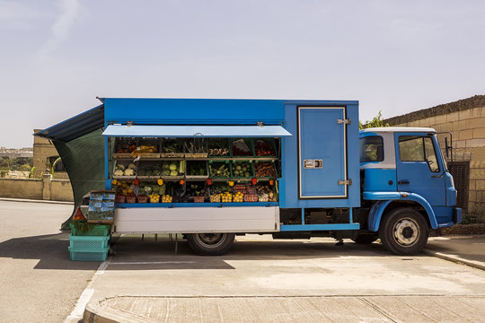 Fruit And Vegetables Are On Sale In The Van