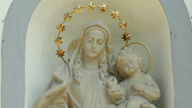 Sculpture of the Madonna and Child close up.