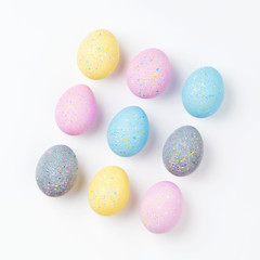 Stylish Set of 9 pale pink, blue, yellow and gray Easter eggs. Compositions in pastel colors.  Easter concept