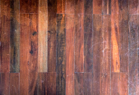 Dark wooden parquet on the floor. Seamless wood floor texture, hardwood floor texture.