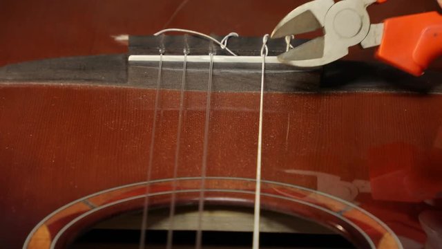 Cutting guitar stings