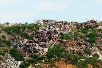 Garbage piles in trash dump or landfill. Pollution concept.