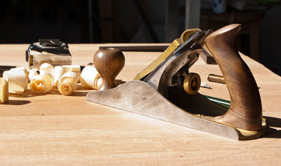 carpenter tools on a wooden board in the workshop