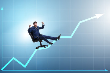 Fototapeta premium Businessman in economic growth concept