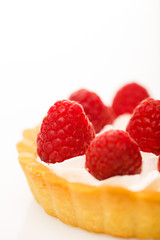 Fresh raspberries cake isolated on white background