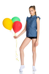 Teenage girl with balloons.