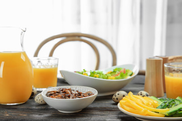 Delicious breakfast served on table