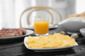 Delicious breakfast served on table