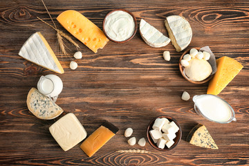 Fresh dairy products on wooden background