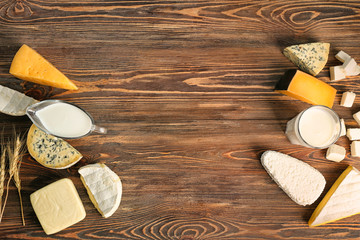 Fresh dairy products on wooden background