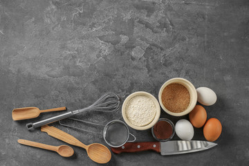 Set of kitchen utensils with products on grey background. Cooking master classes