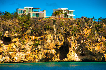 Houses with a view of the little bay in Anguilla - obrazy, fototapety, plakaty