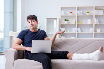 Man with broken leg recovering at home