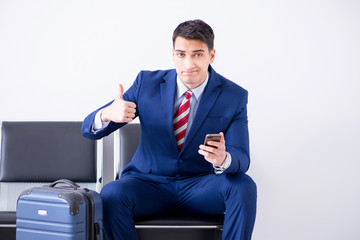 Man wairing to boarding in airport lounge room