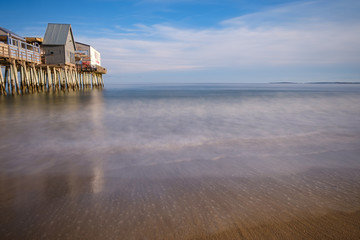 Moss Covered Wood Pilings Under The Old Orchard Beach Pier