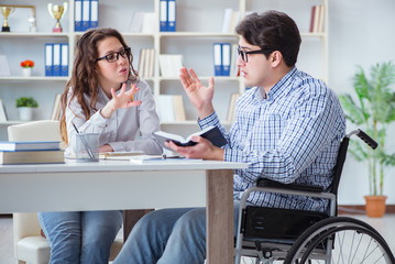 Disabled student studying and preparing for college exams
