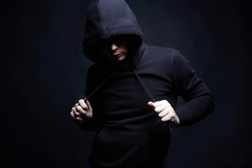 Man in Hat and Hood. Boy,fan, hooligan
