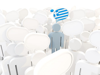 Obraz premium Man with flag of greece in a crowd