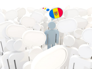 Obraz premium Man with flag of moldova in a crowd