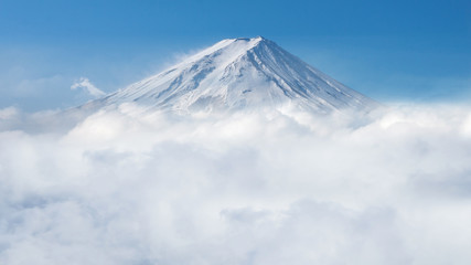 closeup of mount Fuji covered by snow and mist in the morning, Japan