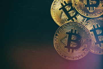 Golden Bitcoin over black background. Business concept.