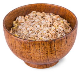 flakes in a bowl on white background, food closeup.