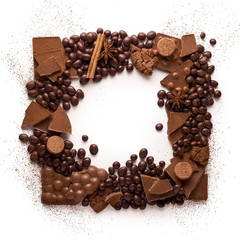 Chocolate frame / Creative concept photo of frame made of chocolate on white background.