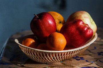 apples orange tangerines fruit basket