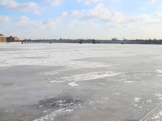 water and ice on a frozen river