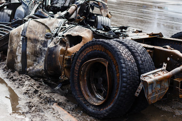 Fototapeta na wymiar Truck burnt and abandoned along the road