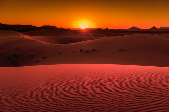 Sunset in the dunes of Erg Chebbi,  Morocco