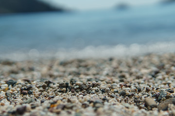Various small pebbles stones on the beach..