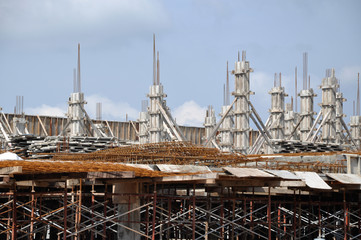 Double storey luxury terrace house scheme under construction at Sendayan, Malaysia. The house structure was made from concrete and wall from clay brick. 