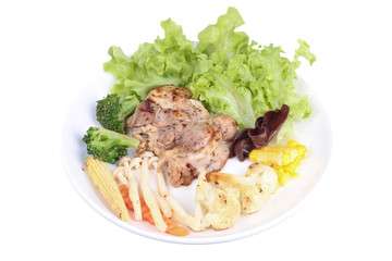 Chicken steak and grilled mixed vegetables .