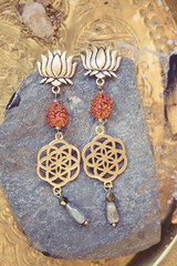 Beautiful lotus and seed of life design earrings