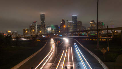 Photo of downtown Houston skyline and traffic at night