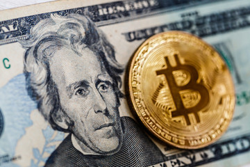 One bitcoin dollars bills closeup macro shot