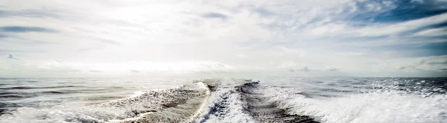 Zelfklevend Fotobehang Oceaan golf Motor boat water traces in open caribbean sea